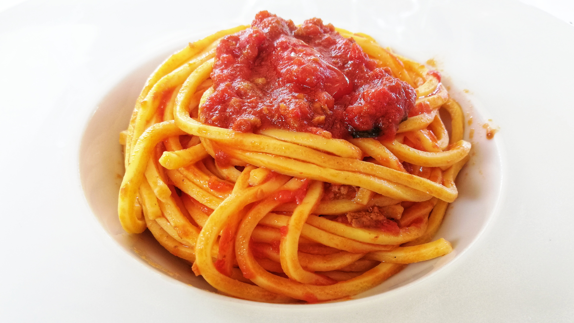 foto piatto pasta alla chitarra, ricetta abruzzese, giornata mondiale della pasta